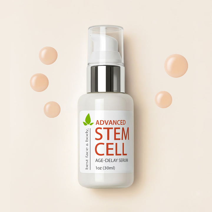 Skincare bottle labeled 'Advanced Stem Cell Age-Delay Serum' on a beige background with small peach-colored serum droplets.