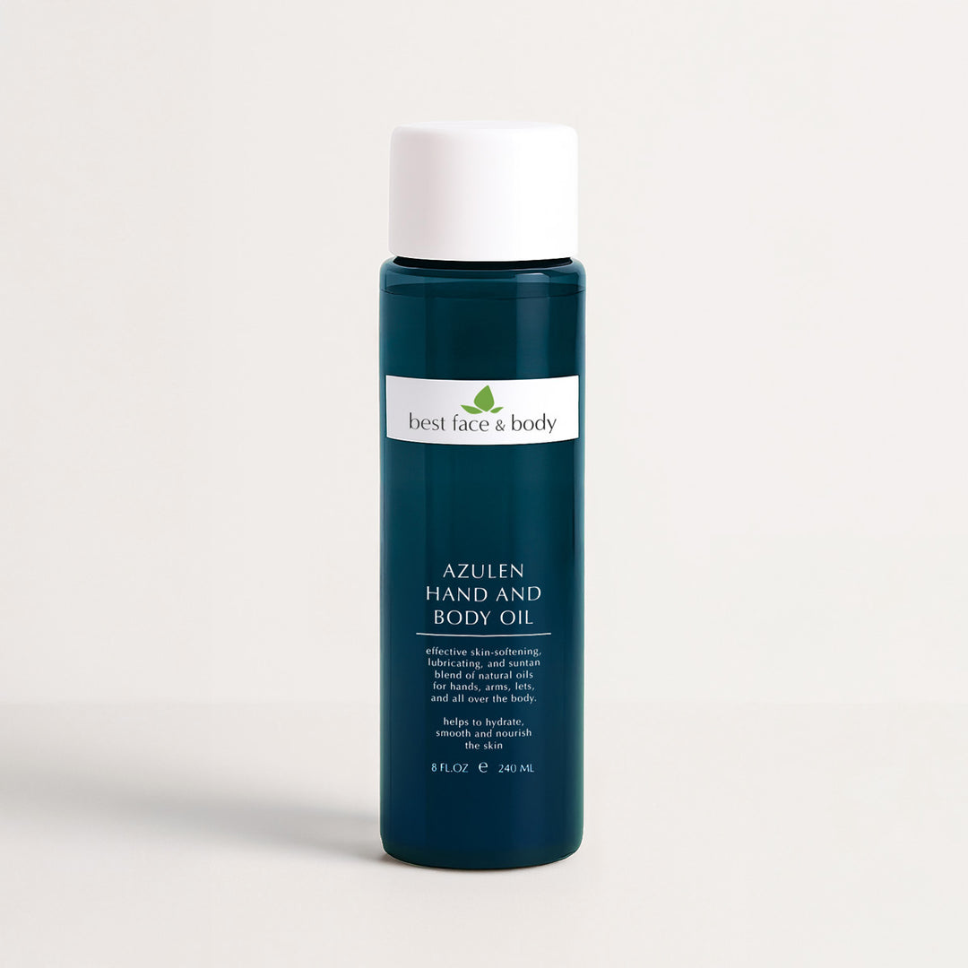 Bottle of 'best face & body' Azulen Hand and Body Oil on a white background