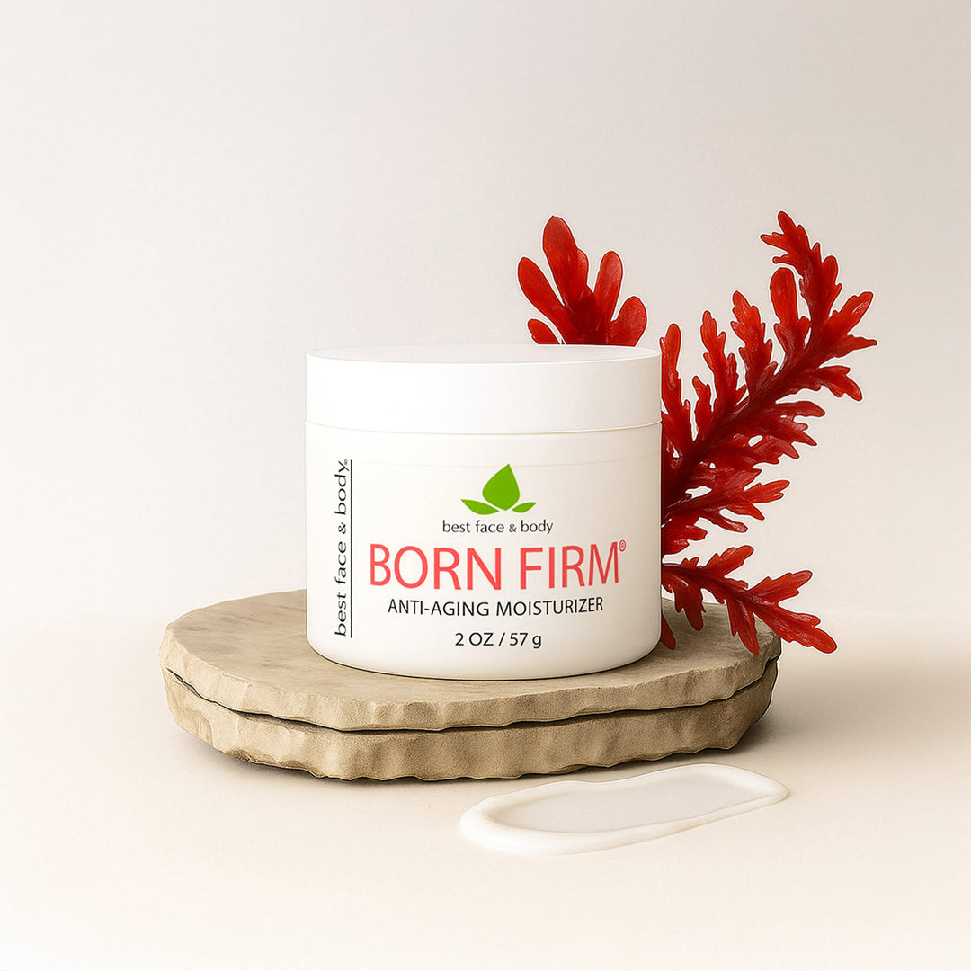 Bottle of 'Born Firm' anti-aging moisturizer on a wooden coaster with red leaves on a light background