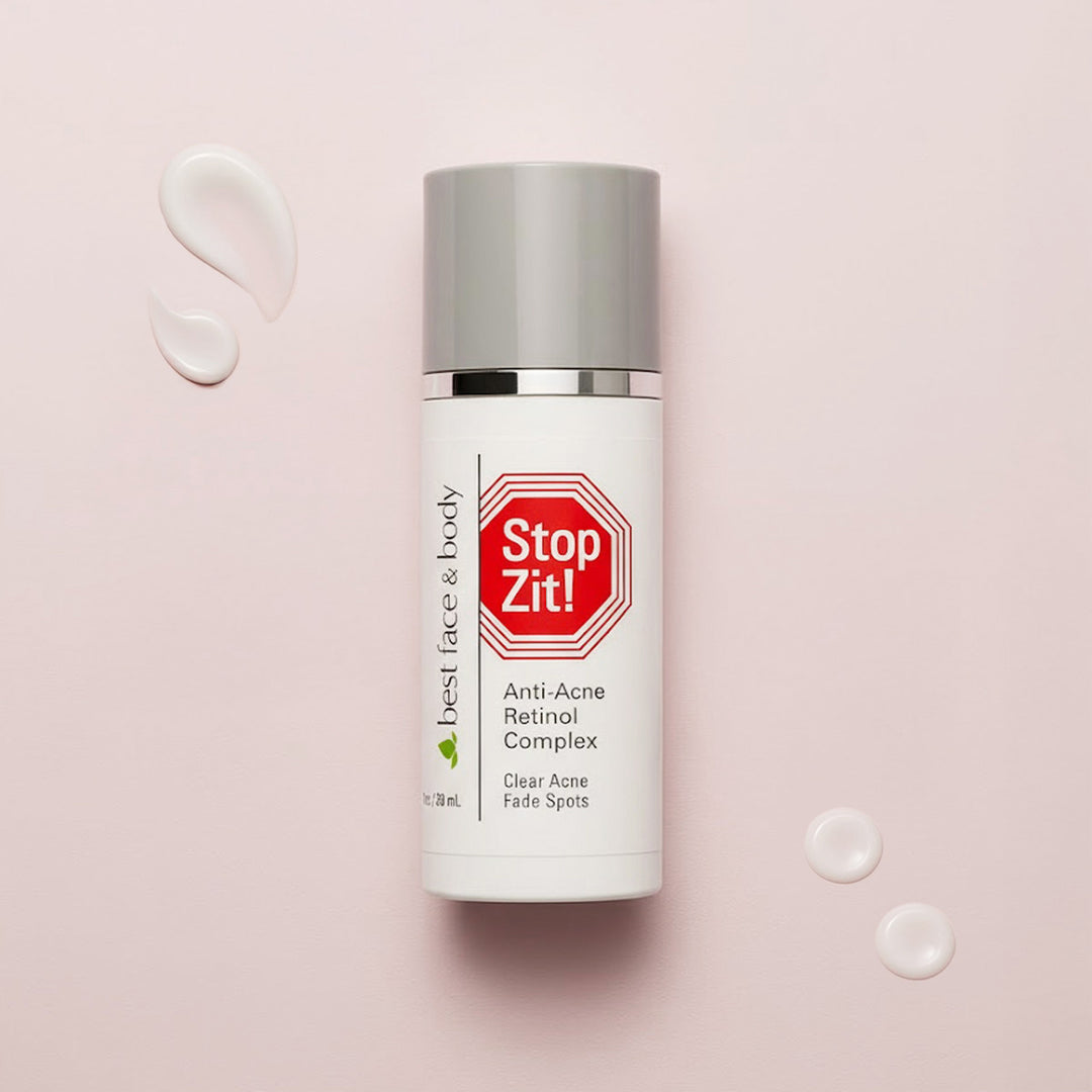 Skincare bottle labeled 'Stop Zit!' on a pink background