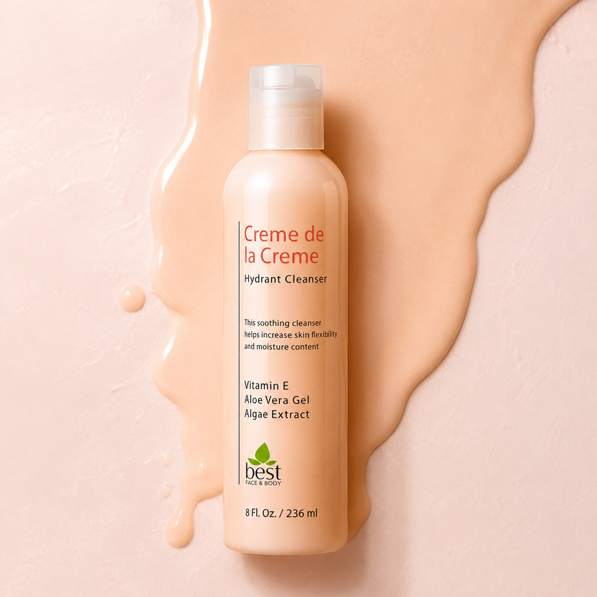 A bottle of Creme de la Creme hydrating cleanser against a light pink background.